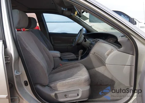 2000 Toyota Avalon Xl z USA, uszkodzony, nr VIN 4T1BF28B3YU020493